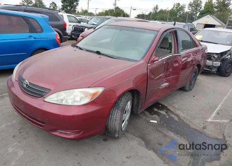 2004 Toyota Camry Le from USA, damaged, VIN 4T1BE32K64U370910